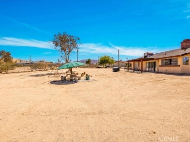 Welcome to this beautifully updated 2,055 sq ft home, ideally on Roadrunner Dunes Golf Course in California - for sale on GolfHomes.com, golf home, golf lot