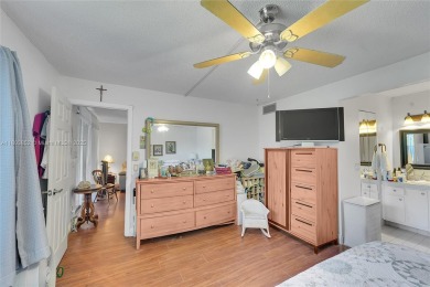 Updated custom kitchen, bathroom and floors, beautiful view of on Sunrise Lakes Phase III in Florida - for sale on GolfHomes.com, golf home, golf lot