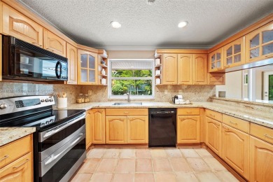 Ideally located on a quiet, tree-lined street in North Coral on Granada Golf Club in Florida - for sale on GolfHomes.com, golf home, golf lot