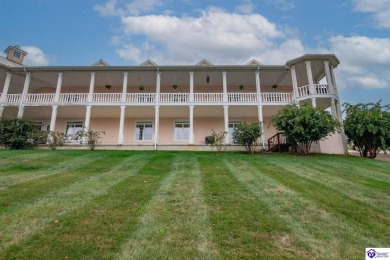Enjoy stunning Doe Valley Lake views from this beautiful condo! on Doe Valley Country Club in Kentucky - for sale on GolfHomes.com, golf home, golf lot