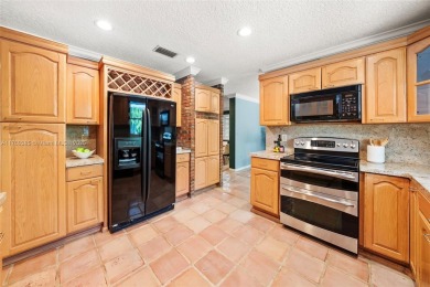 Ideally located on a quiet, tree-lined street in North Coral on Granada Golf Club in Florida - for sale on GolfHomes.com, golf home, golf lot