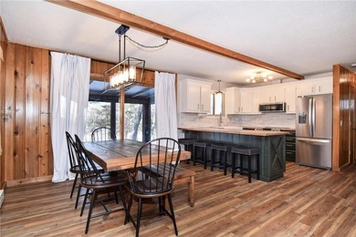 This adorable, updated rambler feels like the perfect Wisconsin on Voyager Village Country Club - Voyager in Wisconsin - for sale on GolfHomes.com, golf home, golf lot