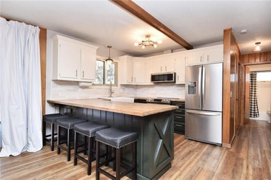 This adorable, updated rambler feels like the perfect Wisconsin on Voyager Village Country Club - Voyager in Wisconsin - for sale on GolfHomes.com, golf home, golf lot