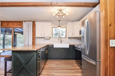 This adorable, updated rambler feels like the perfect Wisconsin on Voyager Village Country Club - Voyager in Wisconsin - for sale on GolfHomes.com, golf home, golf lot