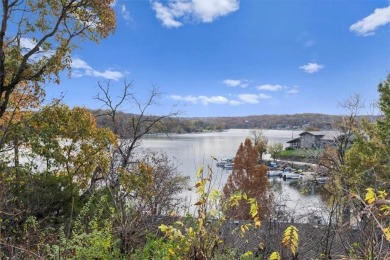 PRICE IMPROVEMENT!!! Welcome to Lake Life! Amazing 1.5 story on Lake Quivira Country Club in Kansas - for sale on GolfHomes.com, golf home, golf lot