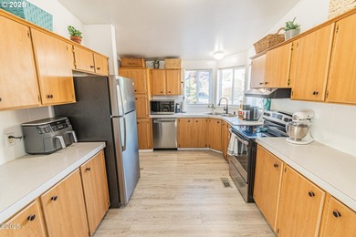 Located in the highly desirable Sun Ridge by the Lake community on Chinook Winds Golf Resort in Oregon - for sale on GolfHomes.com, golf home, golf lot