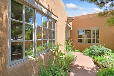 Quail Run's perfect condo - a classic Pinon C floorplan with two on Quail Run Golf Course in New Mexico - for sale on GolfHomes.com, golf home, golf lot