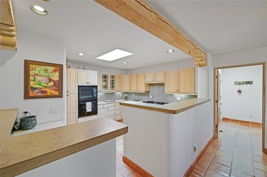 Quail Run's perfect condo - a classic Pinon C floorplan with two on Quail Run Golf Course in New Mexico - for sale on GolfHomes.com, golf home, golf lot