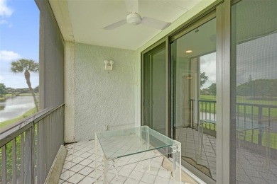 All ages community, this spacious 2-bedroom, 2-bath corner unit on  in Florida - for sale on GolfHomes.com, golf home, golf lot