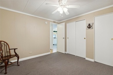 Welcome to Barefoot Bay! This cozy 2 bedroom, 2 bath home is on Barefoot Bay Golf Course in Florida - for sale on GolfHomes.com, golf home, golf lot