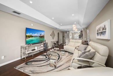 Enjoy sipping your morning coffee from the lanai of this on Royal Palm Golf Club in Florida - for sale on GolfHomes.com, golf home, golf lot