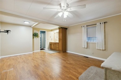 Welcome to Barefoot Bay! This cozy 2 bedroom, 2 bath home is on Barefoot Bay Golf Course in Florida - for sale on GolfHomes.com, golf home, golf lot