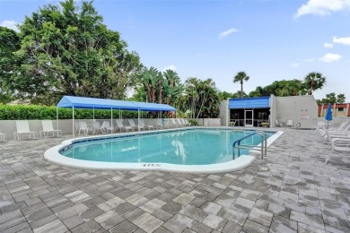 All ages community, this spacious 2-bedroom, 2-bath corner unit on  in Florida - for sale on GolfHomes.com, golf home, golf lot