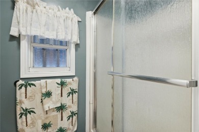 Welcome to Barefoot Bay! This cozy 2 bedroom, 2 bath home is on Barefoot Bay Golf Course in Florida - for sale on GolfHomes.com, golf home, golf lot