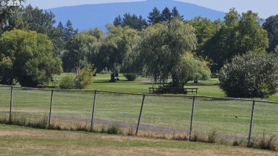 Wonderful property with air conditioning and a swimming pool on Gresham Golf Course in Oregon - for sale on GolfHomes.com, golf home, golf lot