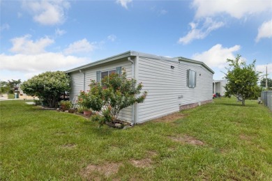 Welcome to Barefoot Bay! This cozy 2 bedroom, 2 bath home is on Barefoot Bay Golf Course in Florida - for sale on GolfHomes.com, golf home, golf lot
