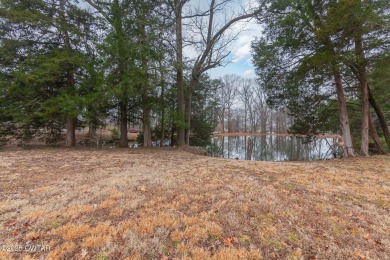 This beautiful, well-maintained home offers 4 bedrooms (possibly on Humboldt Golf and Country Club in Tennessee - for sale on GolfHomes.com, golf home, golf lot