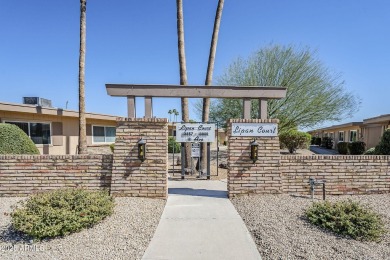 Lovely 2-bedroom, 2-bathroom, 1.5 car garage end unit in Lipan on Sun City Lakes West and East in Arizona - for sale on GolfHomes.com, golf home, golf lot