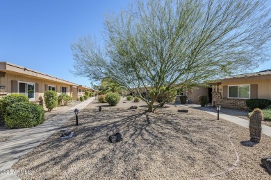 Lovely 2-bedroom, 2-bathroom, 1.5 car garage end unit in Lipan on Sun City Lakes West and East in Arizona - for sale on GolfHomes.com, golf home, golf lot