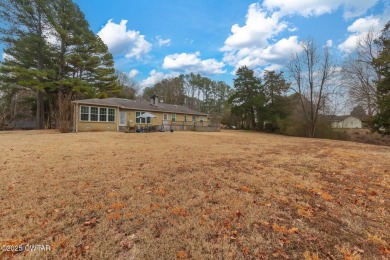 This beautiful, well-maintained home offers 4 bedrooms (possibly on Humboldt Golf and Country Club in Tennessee - for sale on GolfHomes.com, golf home, golf lot