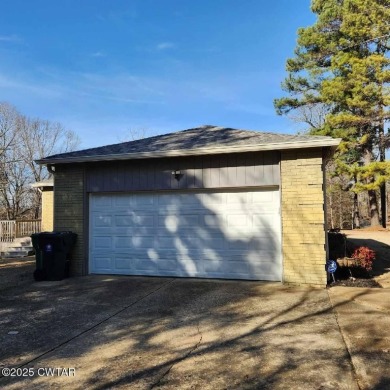 This beautiful, well-maintained home offers 4 bedrooms (possibly on Humboldt Golf and Country Club in Tennessee - for sale on GolfHomes.com, golf home, golf lot