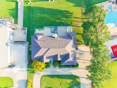 This beautifully updated 4 bed, 3 bath home in Ridgepointe with on RidgePointe Country Club in Arkansas - for sale on GolfHomes.com, golf home, golf lot