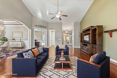 This stunning lakefront home sits perfectly on a peaceful on Wild Wing Plantation in South Carolina - for sale on GolfHomes.com, golf home, golf lot