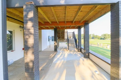 This beautifully updated 4 bed, 3 bath home in Ridgepointe with on RidgePointe Country Club in Arkansas - for sale on GolfHomes.com, golf home, golf lot
