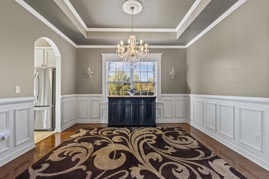 This stunning lakefront home sits perfectly on a peaceful on Wild Wing Plantation in South Carolina - for sale on GolfHomes.com, golf home, golf lot