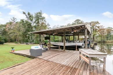 THE VIEW!! Quiet  Peaceful. BOATING!! Covered boat house with 2 on Cypress Country Club and Golf Club  in Alabama - for sale on GolfHomes.com, golf home, golf lot