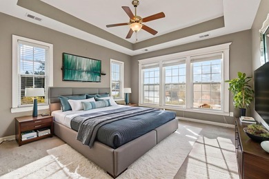 This stunning lakefront home sits perfectly on a peaceful on Wild Wing Plantation in South Carolina - for sale on GolfHomes.com, golf home, golf lot