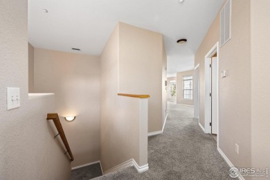 MOTIVATED SELLER! This contemporary turn-key 2-bedroom end-unit on The Broadlands Golf Course in Colorado - for sale on GolfHomes.com, golf home, golf lot