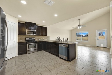 Beautiful two-story home located in the sought-after Mission Del on Mission Del Lago Municipal Golf Course in Texas - for sale on GolfHomes.com, golf home, golf lot