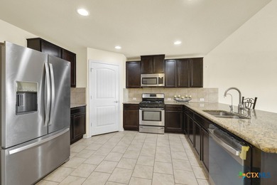 Beautiful two-story home located in the sought-after Mission Del on Mission Del Lago Municipal Golf Course in Texas - for sale on GolfHomes.com, golf home, golf lot