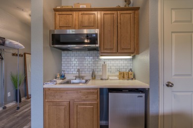 Turnkey Investment Condo in Stonebridge Village - Booked and on Ledgestone Country Club and Golf Course in Missouri - for sale on GolfHomes.com, golf home, golf lot