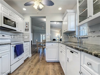 DISCOVER YOUR FLORIDA RETREAT IN HERONS GLEN - GOLF COURSE VIEWS on Herons Glen Golf and Country Club in Florida - for sale on GolfHomes.com, golf home, golf lot