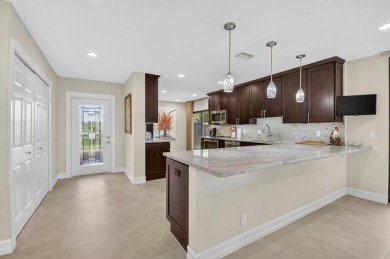 Experience refined country club living in this beautifully on Hunters Run Golf and Country Club in Florida - for sale on GolfHomes.com, golf home, golf lot