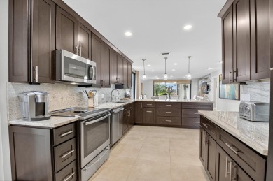 Experience refined country club living in this beautifully on Hunters Run Golf and Country Club in Florida - for sale on GolfHomes.com, golf home, golf lot