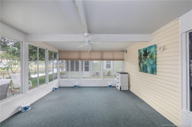 Enjoy peaceful water views and your own Mango Tree from this on Savanna Golf Club in Florida - for sale on GolfHomes.com, golf home, golf lot