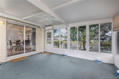 Enjoy peaceful water views and your own Mango Tree from this on Savanna Golf Club in Florida - for sale on GolfHomes.com, golf home, golf lot