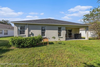 Welcome to this beautifully maintained four-bedroom on Hernando Oaks Golf and Country Club in Florida - for sale on GolfHomes.com, golf home, golf lot