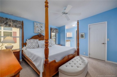 Enjoy peaceful water views and your own Mango Tree from this on Savanna Golf Club in Florida - for sale on GolfHomes.com, golf home, golf lot