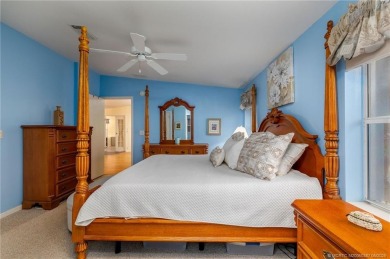 Enjoy peaceful water views and your own Mango Tree from this on Savanna Golf Club in Florida - for sale on GolfHomes.com, golf home, golf lot