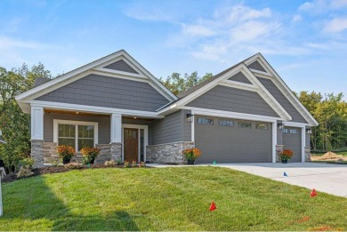 Step into effortless living with this zero-barrier entry custom on Boulder Pointe Golf Club in Minnesota - for sale on GolfHomes.com, golf home, golf lot