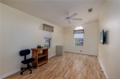 Enjoy peaceful water views and your own Mango Tree from this on Savanna Golf Club in Florida - for sale on GolfHomes.com, golf home, golf lot