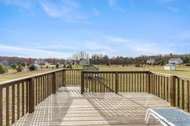 Rare find! Newer built home on 2 acres in popular Caledonia on Saskatoon Golf Club in Michigan - for sale on GolfHomes.com, golf home, golf lot