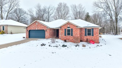 Located in the heart of Santa Claus, this well-maintained on Christmas Lake Golf Course in Indiana - for sale on GolfHomes.com, golf home, golf lot