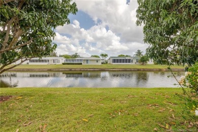 Enjoy peaceful water views and your own Mango Tree from this on Savanna Golf Club in Florida - for sale on GolfHomes.com, golf home, golf lot