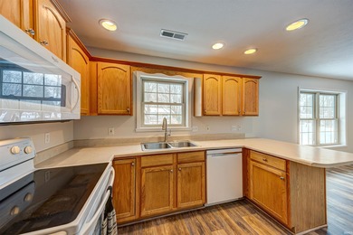 Located in the heart of Santa Claus, this well-maintained on Christmas Lake Golf Course in Indiana - for sale on GolfHomes.com, golf home, golf lot