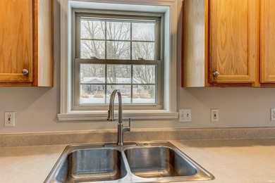 Located in the heart of Santa Claus, this well-maintained on Christmas Lake Golf Course in Indiana - for sale on GolfHomes.com, golf home, golf lot